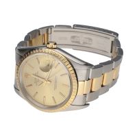 Date acero y oro oyster 34mm.   