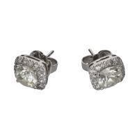 Pendientes dormilonas en oro blanco y brillantes.