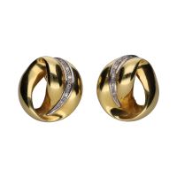 Pendientes circulares en oro amarillo y brillantes.