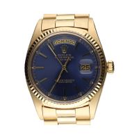 Day-date president oro amarillo esfera azul 36mm.   