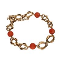 Pulsera en oro amarillo con bolas de coral.