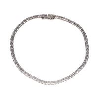 Pulsera riviere en oro blanco con brillantes.