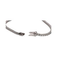 Pulsera riviere en oro blanco con brillantes.