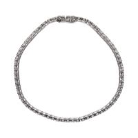 Pulsera riviere en oro blanco con brillantes.
