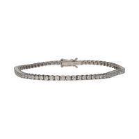 Pulsera riviere en oro blanco con brillantes.