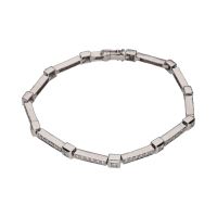 Pulsera tipo riviere en oro blanco con brillantes.