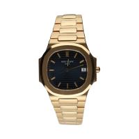 Nautilus oro amarillo quartz 33mm.    