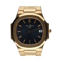 Nautilus oro amarillo quartz 33mm.    
