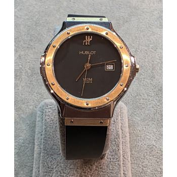 HUBLOT<BR>CLASSIC CADETE ACERO Y ORO 32MM. · ref.: 1401.100.2