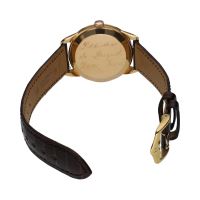 Clásico cuerda manual oro amarillo 36mm.   