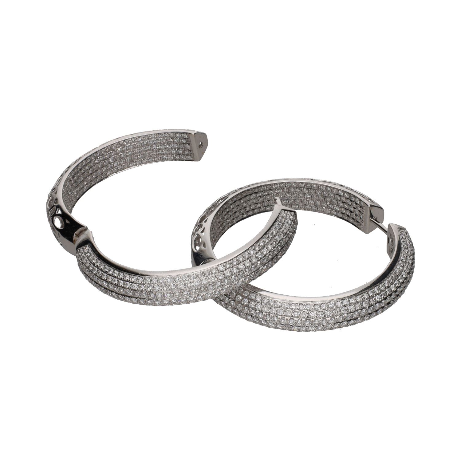 Pendientes argollas oro blanco brillantes.