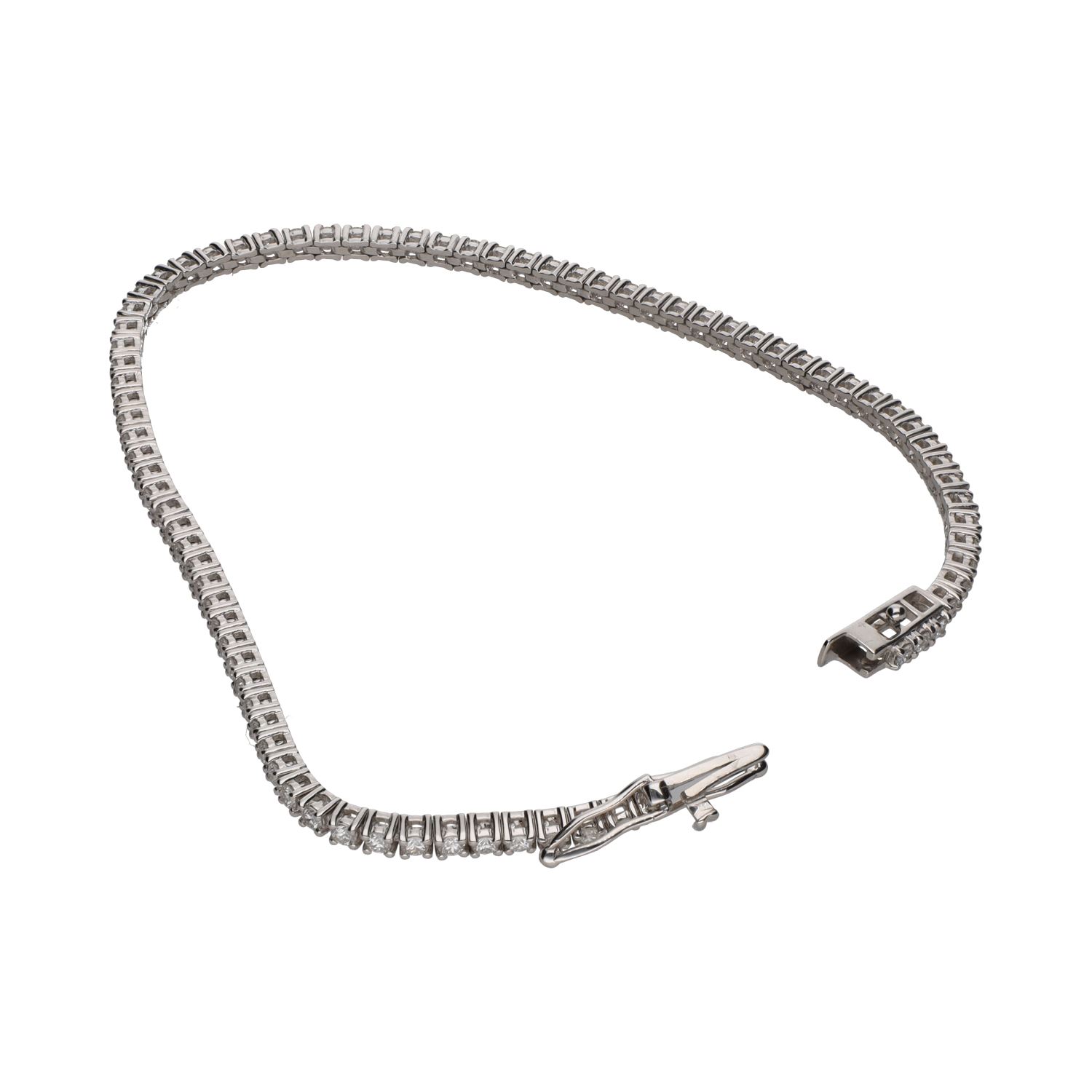 Pulsera riviere en oro blanco con brillantes.