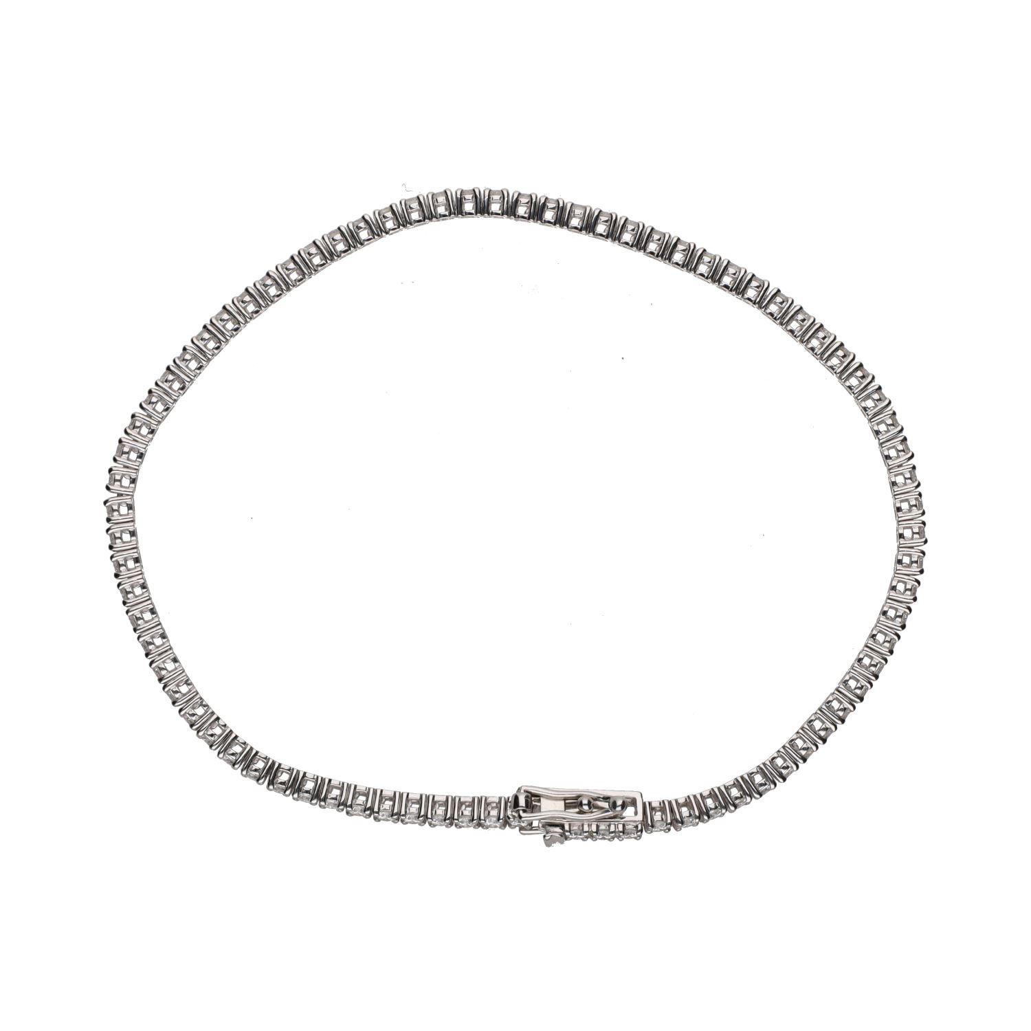 Pulsera riviere en oro blanco con brillantes.