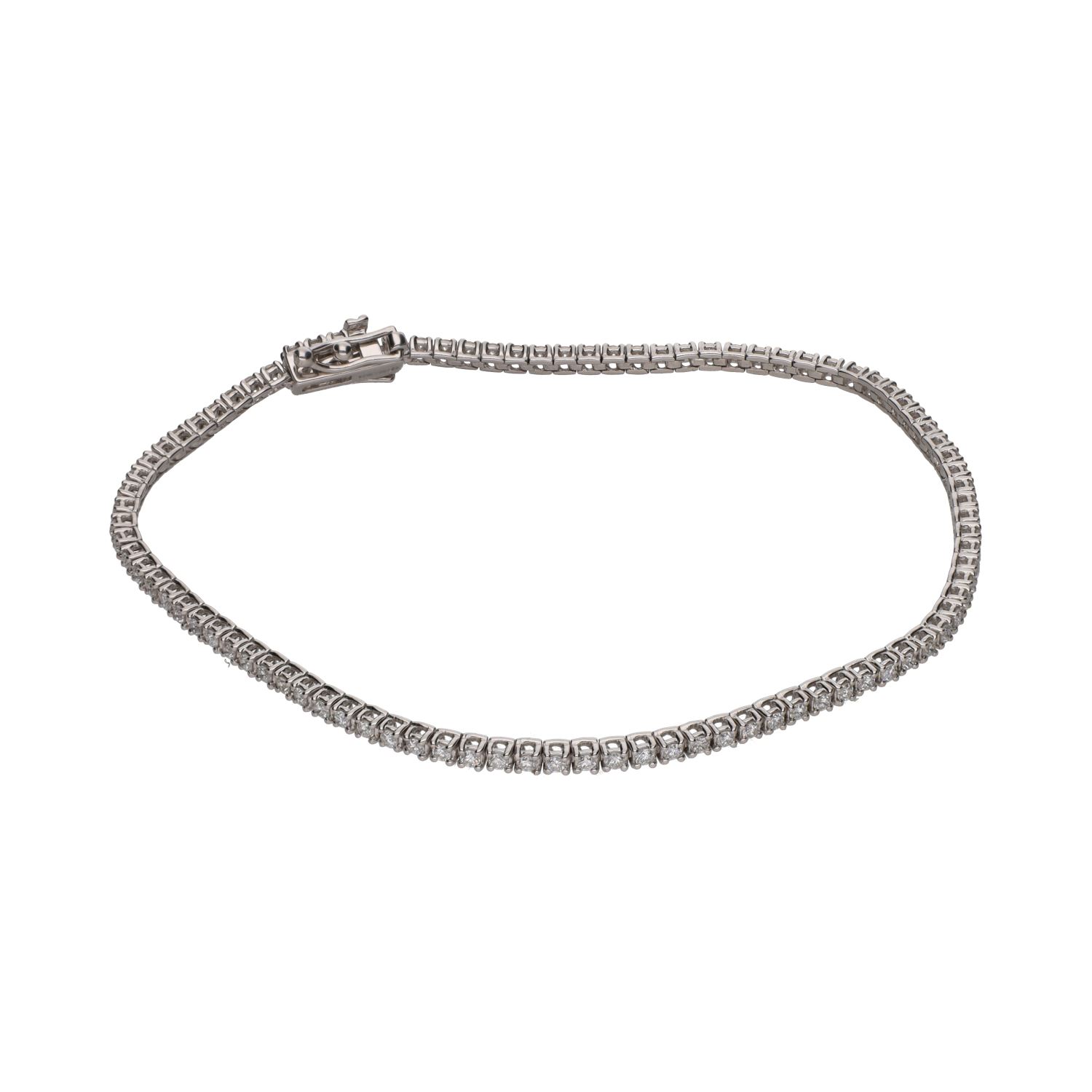 Pulsera riviere en oro blanco con brillantes.