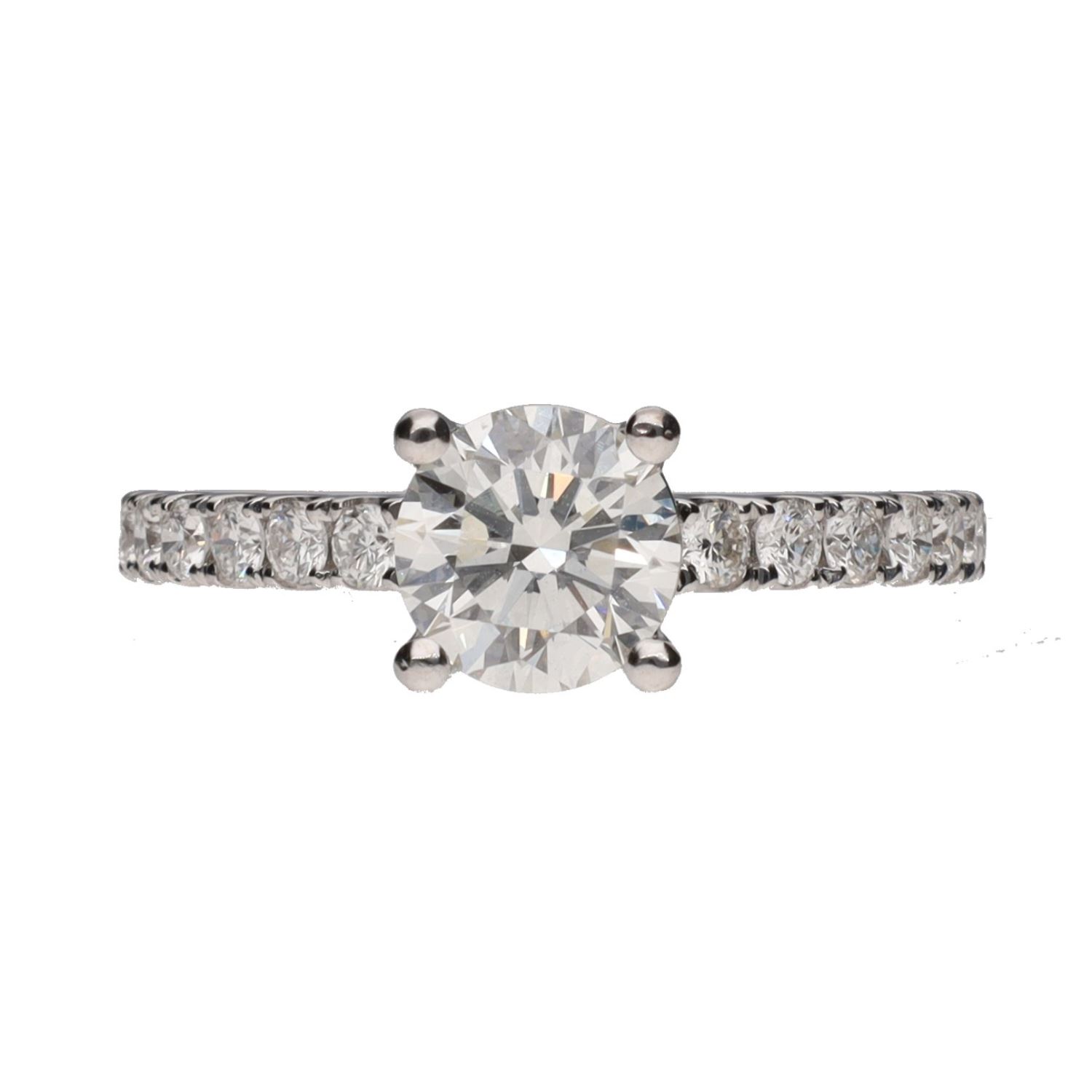 Sortija solitario en oro blanco con brillantes.   Talla 13.