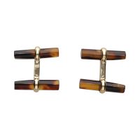 Gemelos f van cleef en oro amarillo con ojo de tigre.