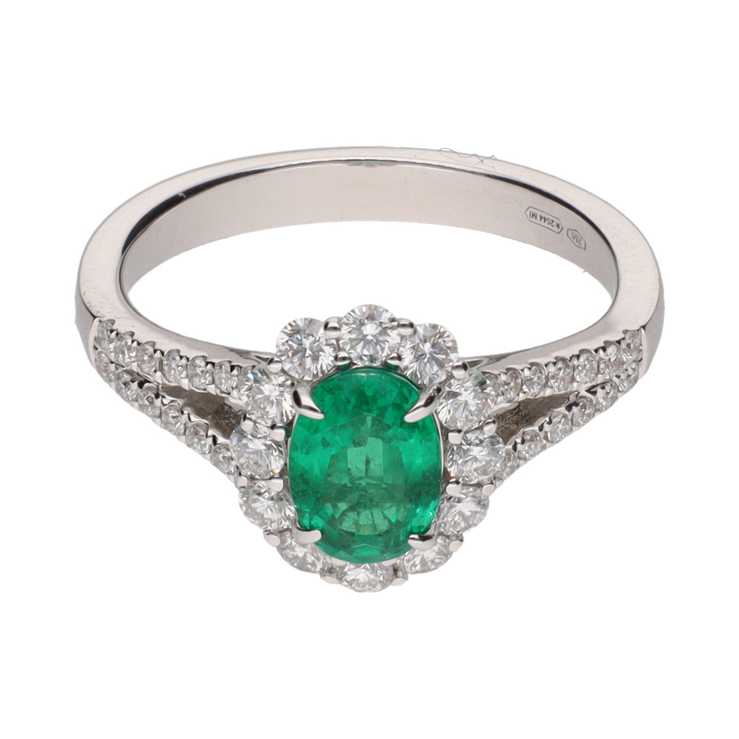 Sortija en oro blanco con esmeralda y brillantes. Talla 14.