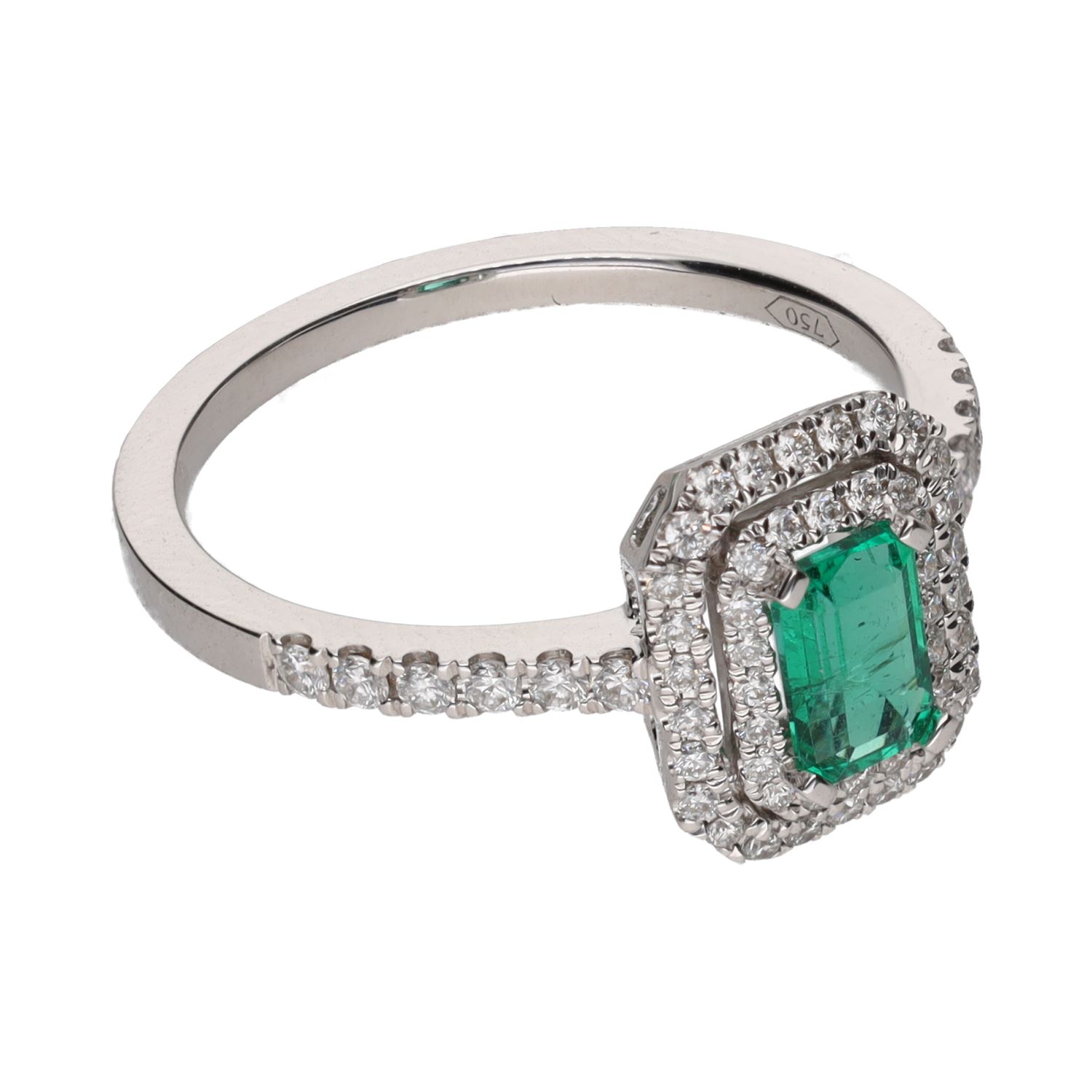 Sortija en oro blanco con esmeralda y brillantes. Talla 14.