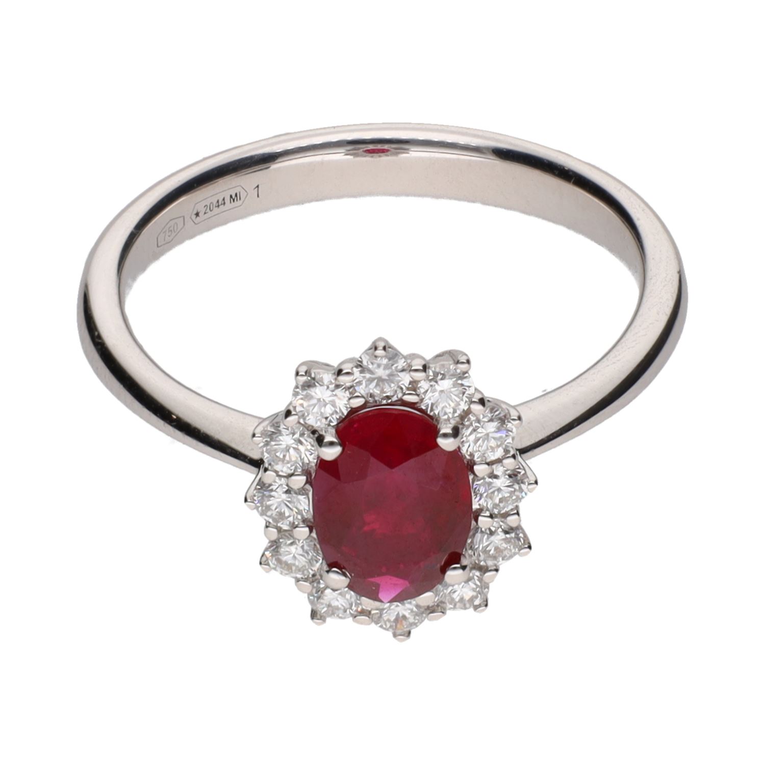 Sortija en oro blanco con rubí y brillantes. Talla 14.