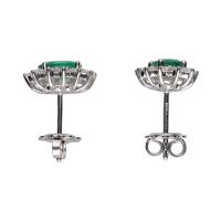 Pendientes en oro blanco con esmeraldas y brillantes.
