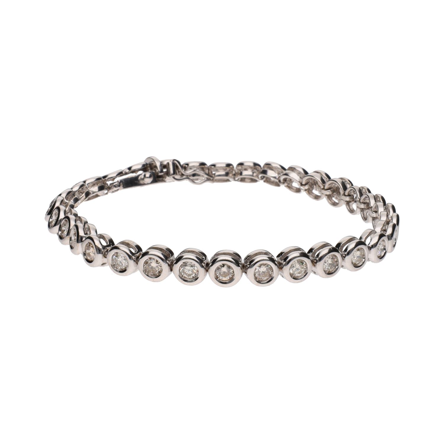 Pulsera riviere en oro blanco con brillantes en chatón.