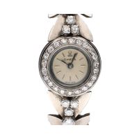 Reloj pulsera antiguo en oro blanco con brillantes.  