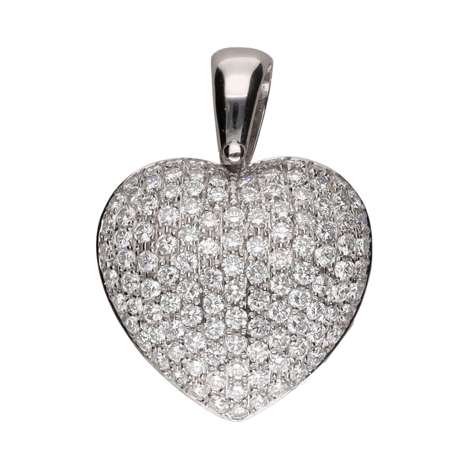 Colgante con forma de corazón en oro blanco y cuajado de brillantes.