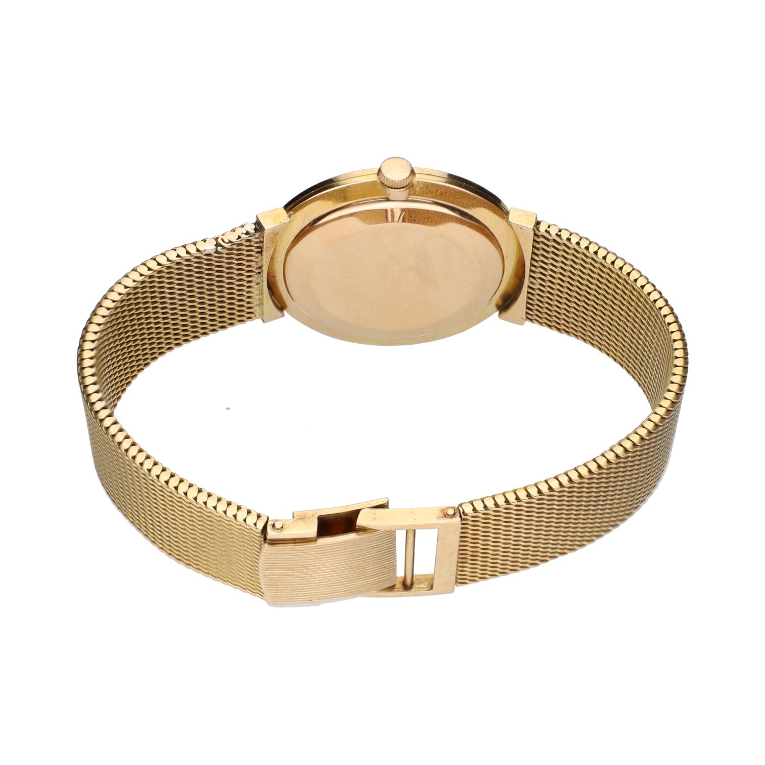 Clasico cuerda manual oro amarillo 32mm.   