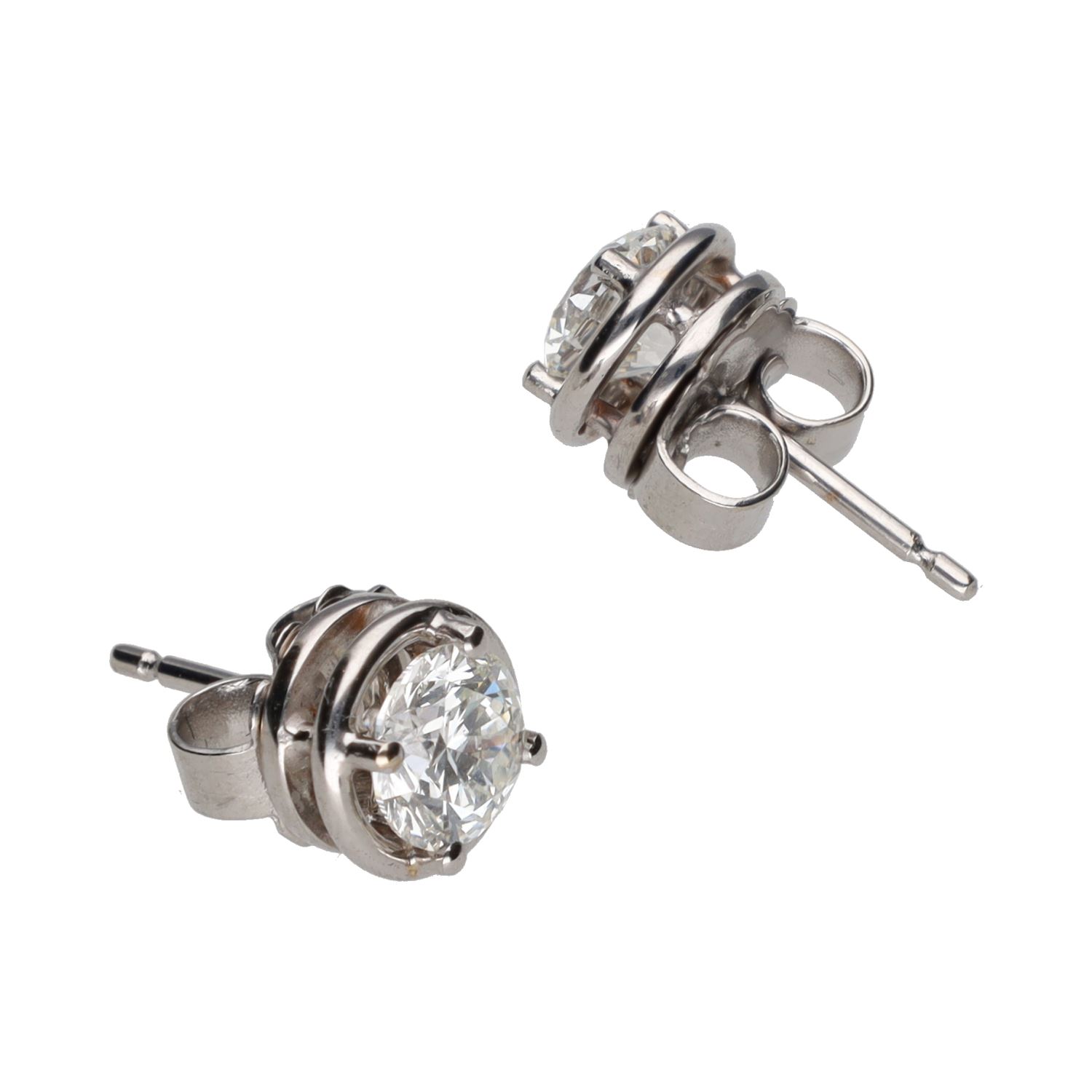 Pendientes dormilonas en oro blanco con brillantes.