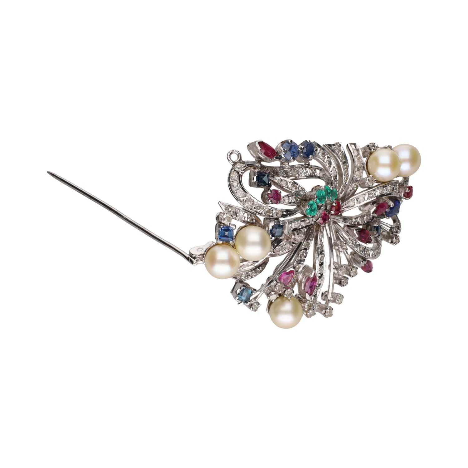 Broche en oro blanco con perlas, rubíes, esmeraldas, zafiros y brillantes.