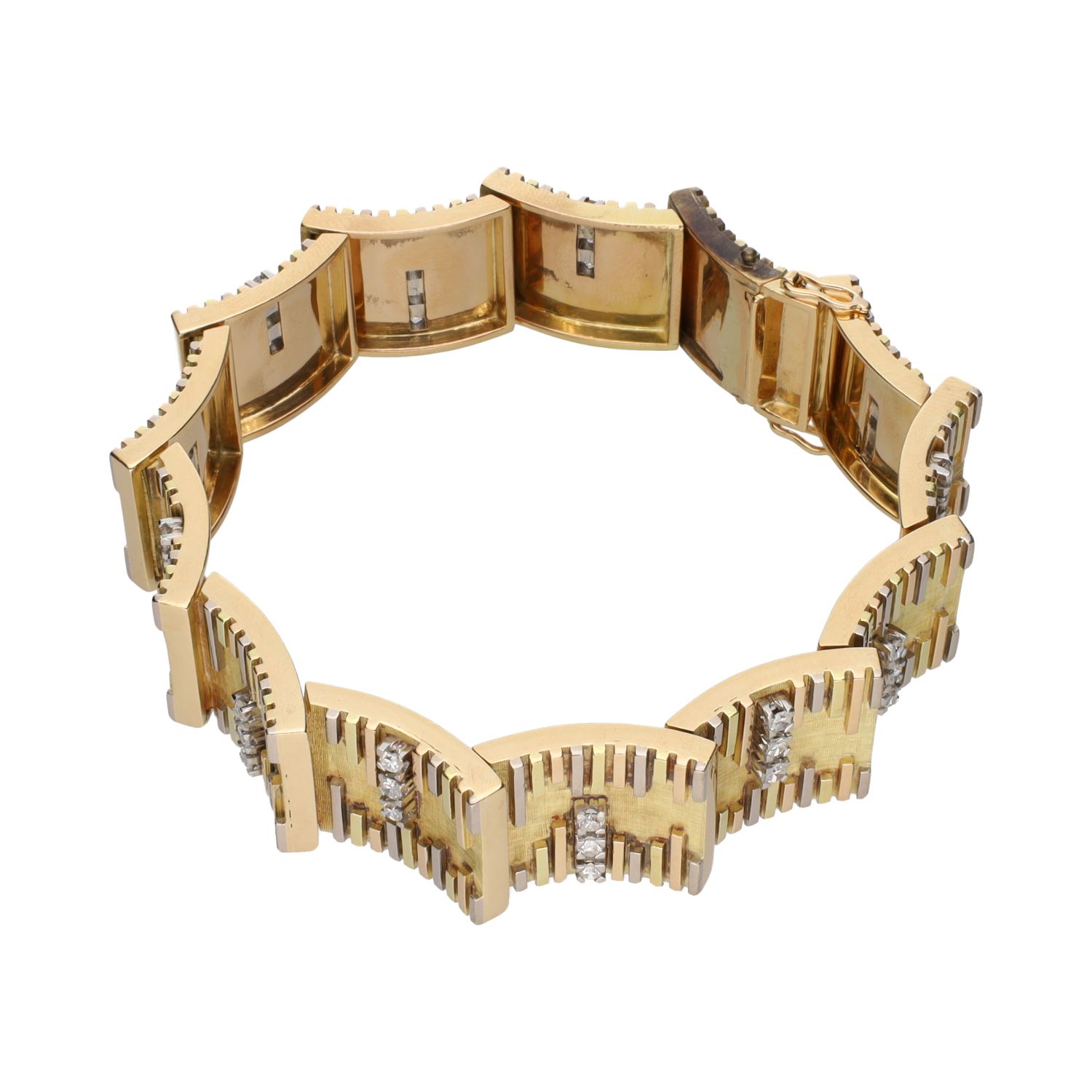 Pulsera en oro amarillo con brillantes.