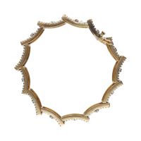 Pulsera en oro amarillo con brillantes.