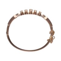 Pulsera antigua rígida en oro amarillo con diamantes.