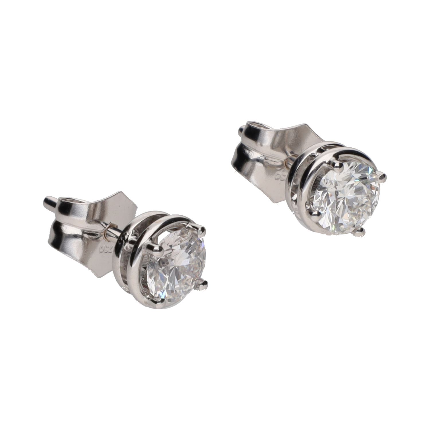 Pendientes dormilonas en oro blanco con brillantes.
