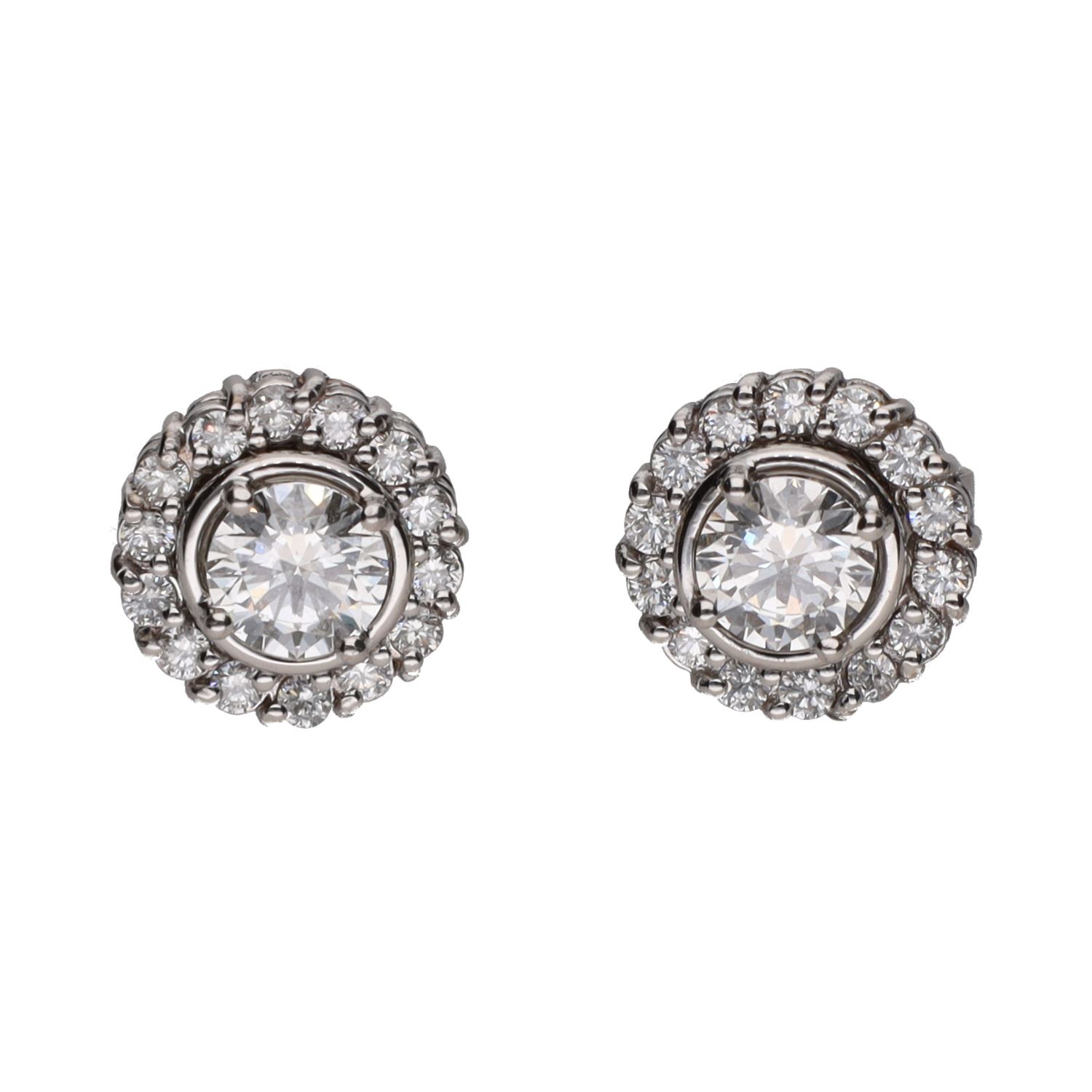 Pendientes dormilonas con orla desmontable en oro blanco con brillantes.