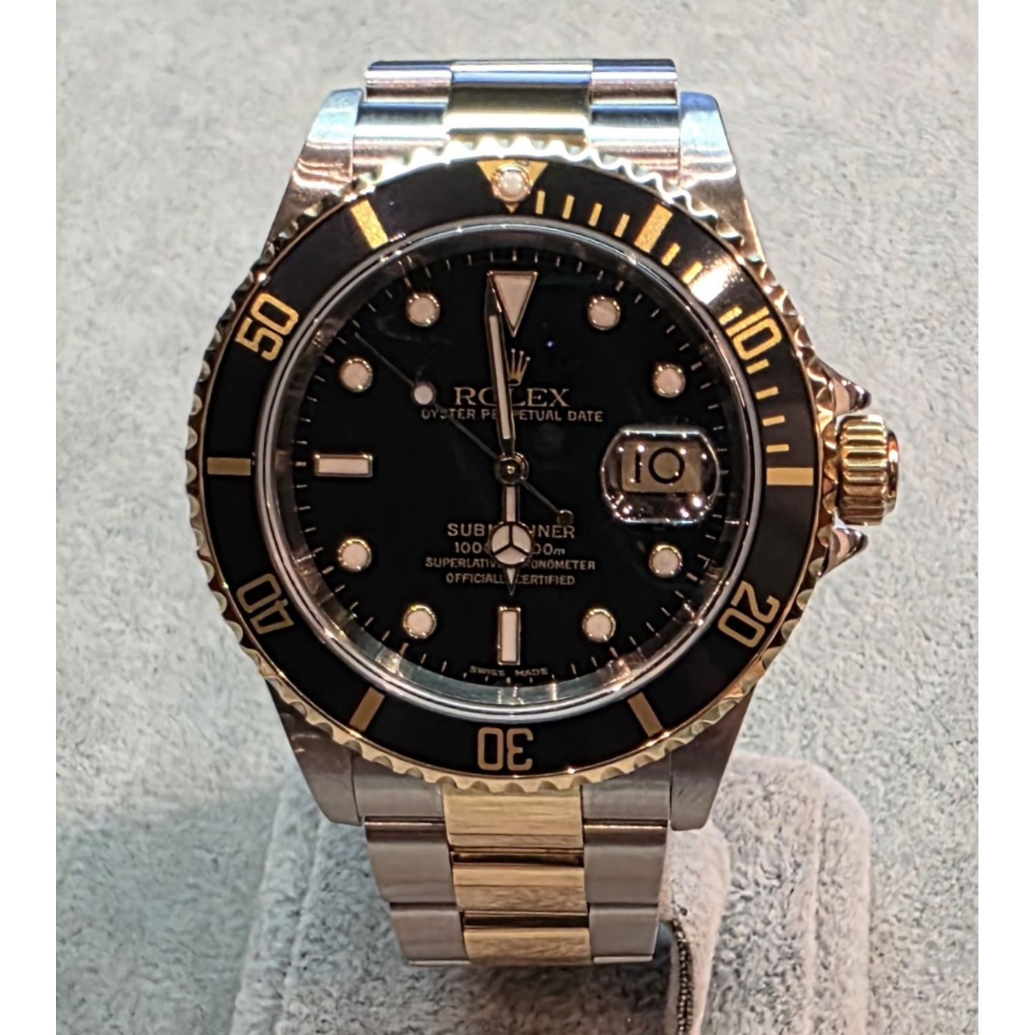 Submariner date acero y oro esfera negra 40mm.   