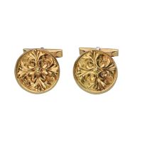 Gemelos en oro amarillo con forma de medallón.