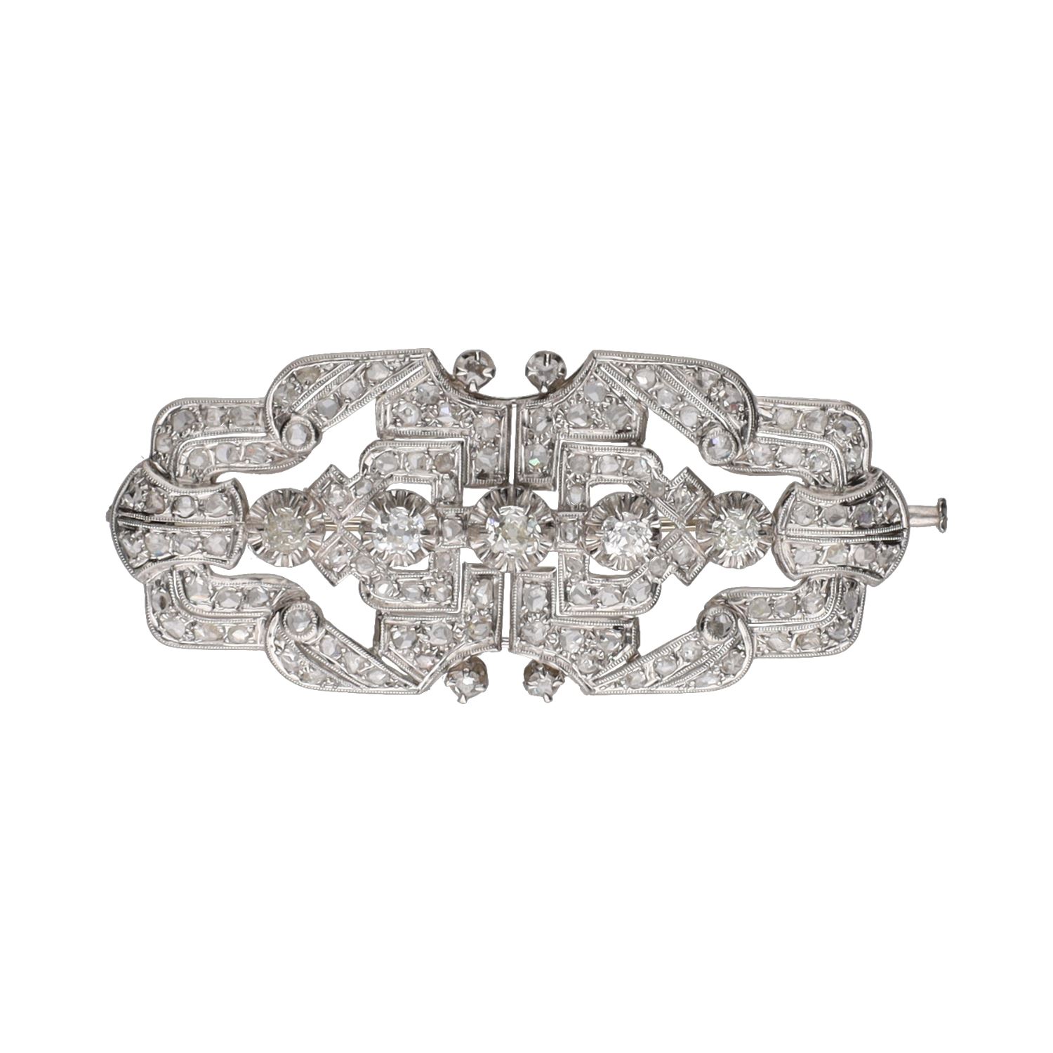 Broche antiguo en oro blanco con diamantes.